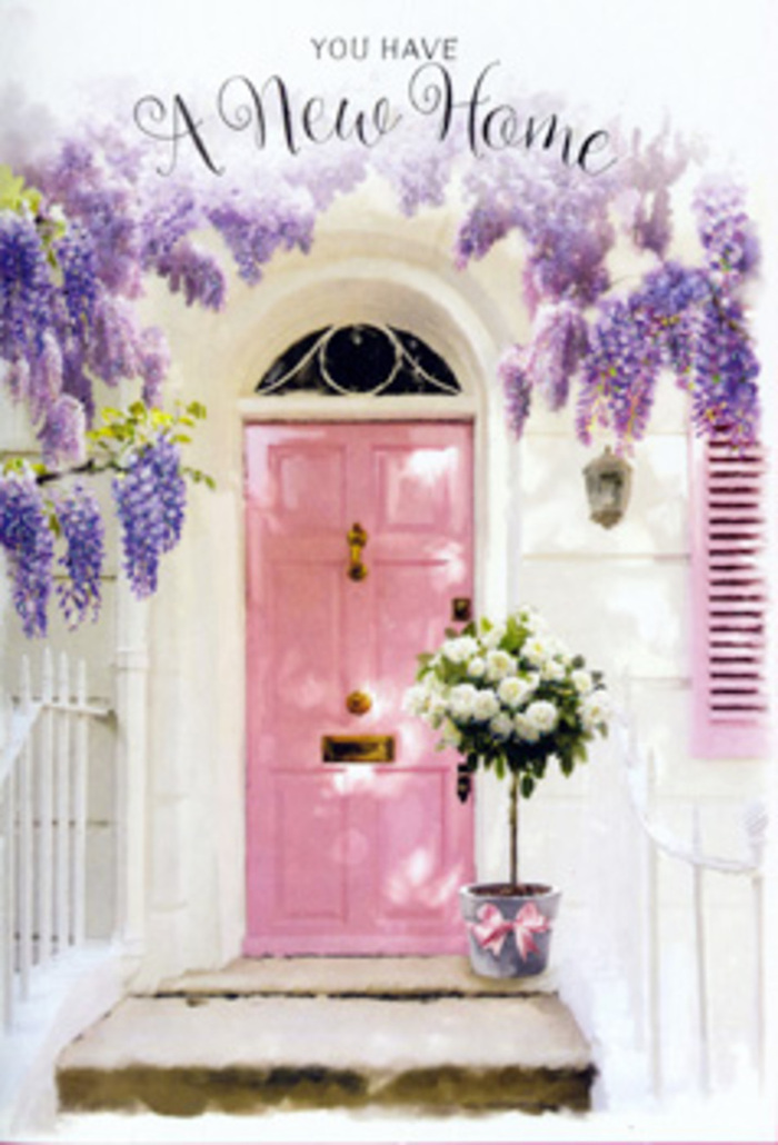The image presents a dreamy Earl's Court doorstep styled with all the care of a seasoned florist preparing flowers for a cherished housewarming. At the centre stands a charming pink front door, its colour a gentle, powdery blush that suggests warmth and openness. The door is framed by tidy whitewashed walls, their smooth texture catching soft daylight and reflecting it back in a muted, creamy glow. Overhead, a profusion of wisteria drapes down in cascades of lavender blossoms, each drooping cluster made up of countless small petals that create a sense of flowing movement and romantic abundance. The wisteria frames the top and sides of the doorway almost like a garland, hinting at the leafy gardens tucked behind the classic façades of Earl's Court. On the step, positioned neatly before the door, rests a grey galvanized-style bucket. It is filled with a lush display of white and cream roses, the blooms full and velvety, some just beginning to open, others already unfurling into wide, soft whorls. Delicate sprigs of green foliage weave between the roses, breaking up the expanse of pale petals and adding a fresh, garden-grown feel. Around the bucket's base, a pink ribbon is tied into a simple bow, its gentle sheen and colour perfectly echoing the door and adding a sweet finishing flourish. The lighting is calm and even, suggesting a quiet afternoon or early evening, perhaps just after a same-day flower delivery to this Earl's Court address. The mood is serene and quietly joyful, as if these flowers were chosen to mark a move-in day, a new set of keys, or a special milestone, turning an ordinary step into a tender symbol of welcome and hope.